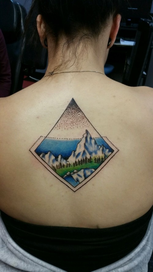 Icy Mountains And Trees In Diamond Shape Tattoo On Upper Back