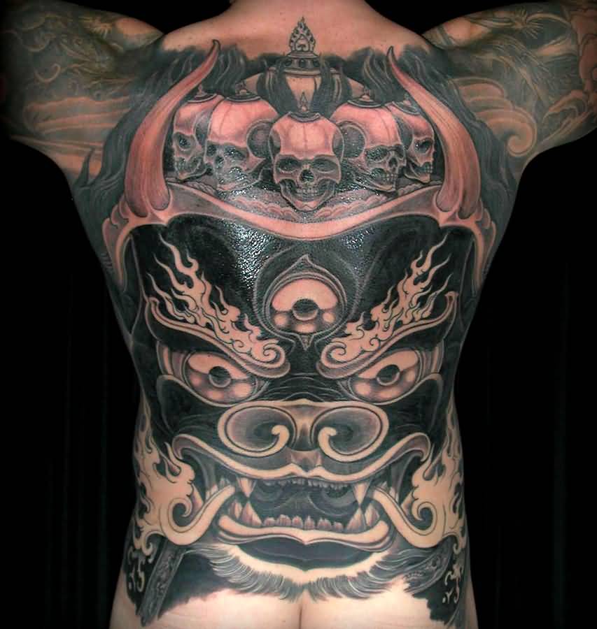 Incredible Chinese Foo Dog Having Horns With Skulls And Tattoo On Full Back