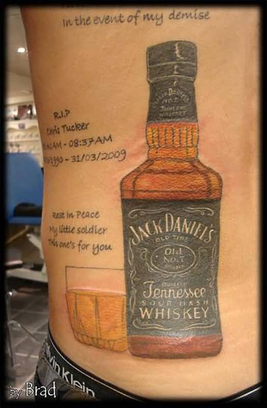 Jack Daniel Bottle With Lettering Tattoo On Side Rib