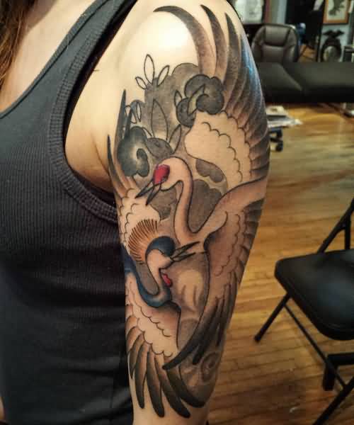 Japanese Crane Tattoo On Man Left Half Sleeve