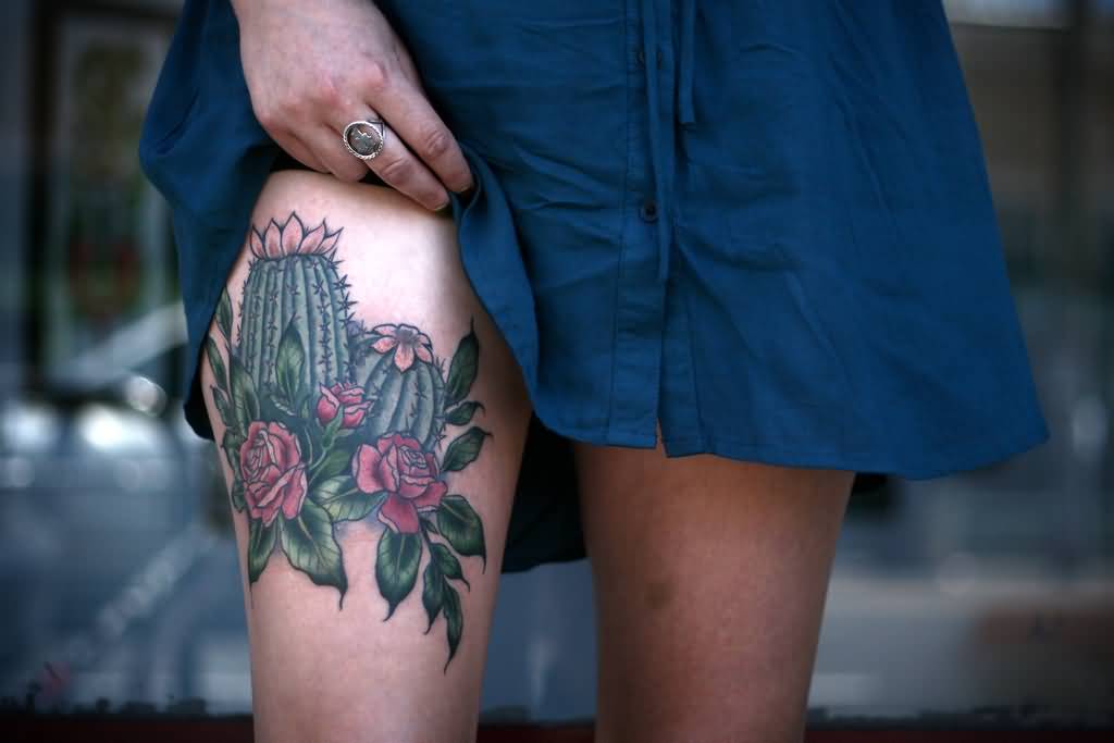 Lovely Cactus With Flowers Traditional Tattoo On Thigh