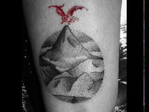 Lovely Dotwork Mountains In Circle Tattoo