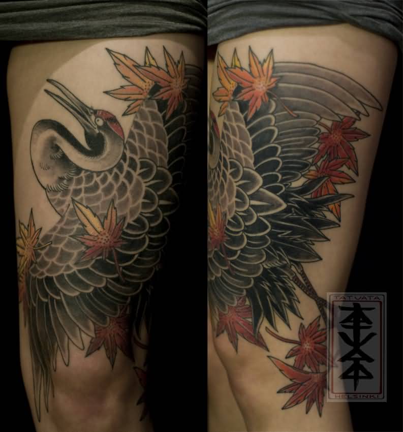 Maple Leaves And Crane Tattoo On Thigh