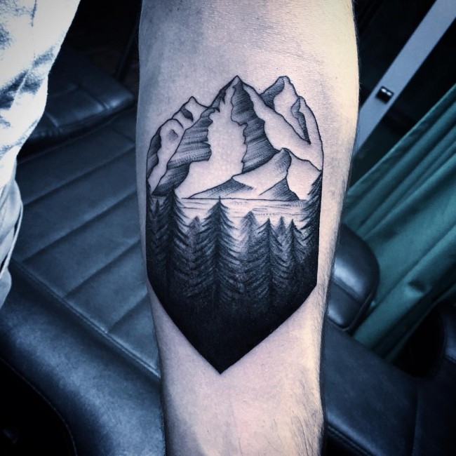 Mountains And Pine Trees On Forearm Tattoo