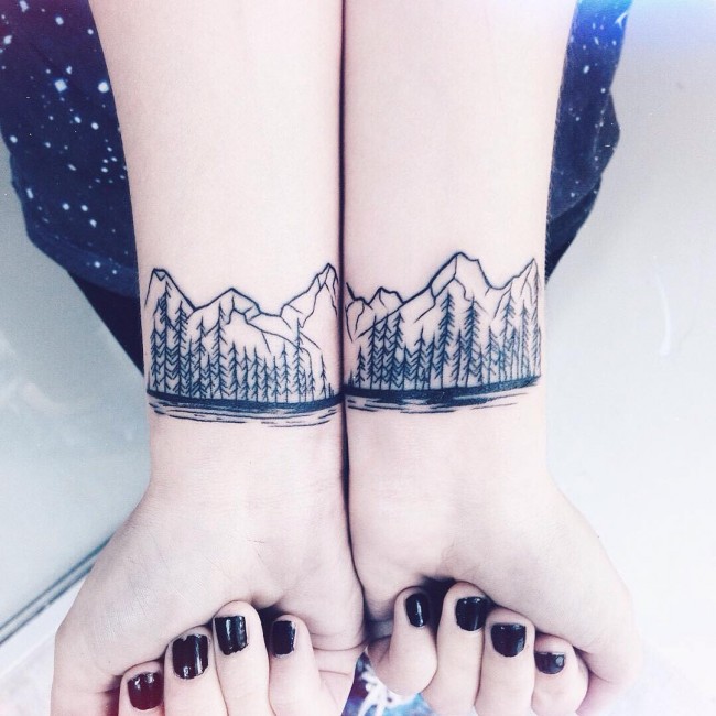Mountains And Pine Trees Tattoos On Both Wrists