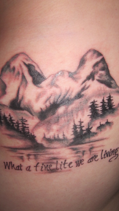 Mountains And Trees With Lettering Tattoo