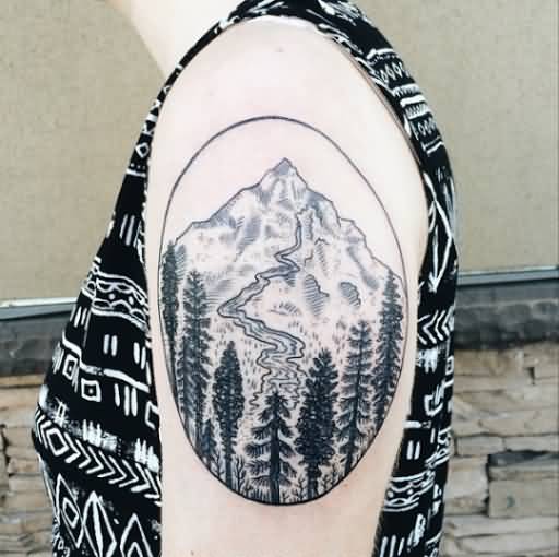 Mountains Scene In Circle Tattoo On Left Shoulder