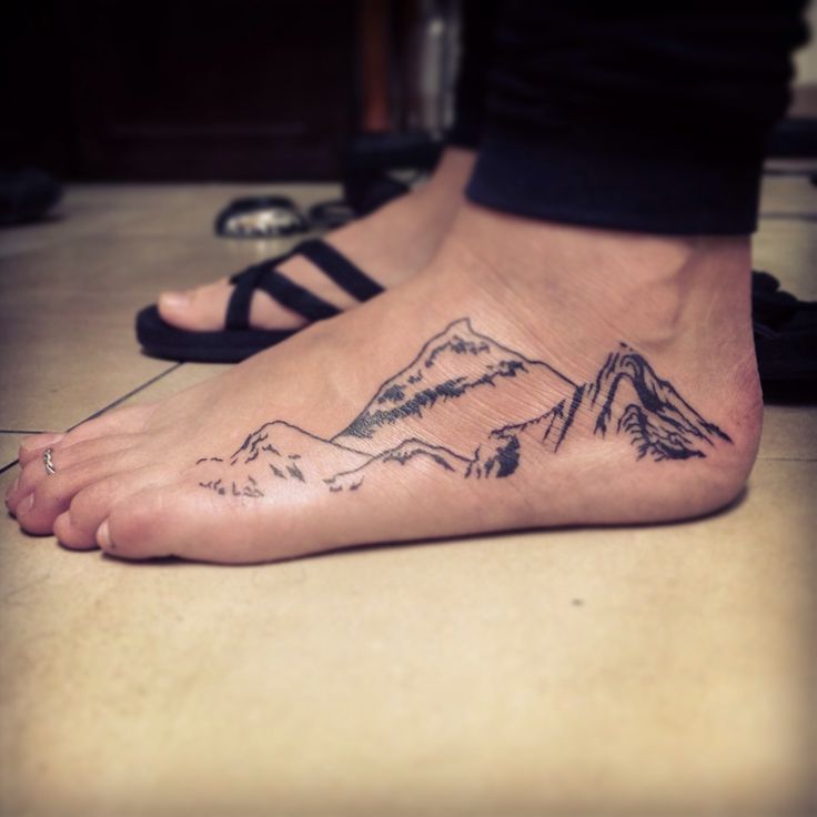 Mountains Tattoo On Left Foot