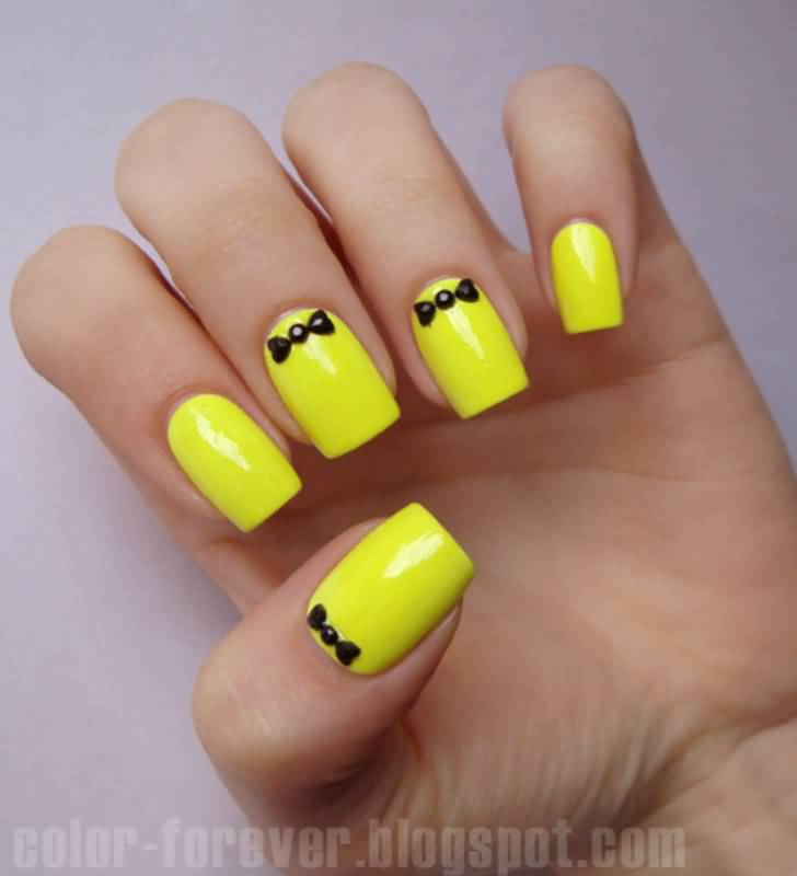 Neon Yellow Nails With Black 3d Bow Design