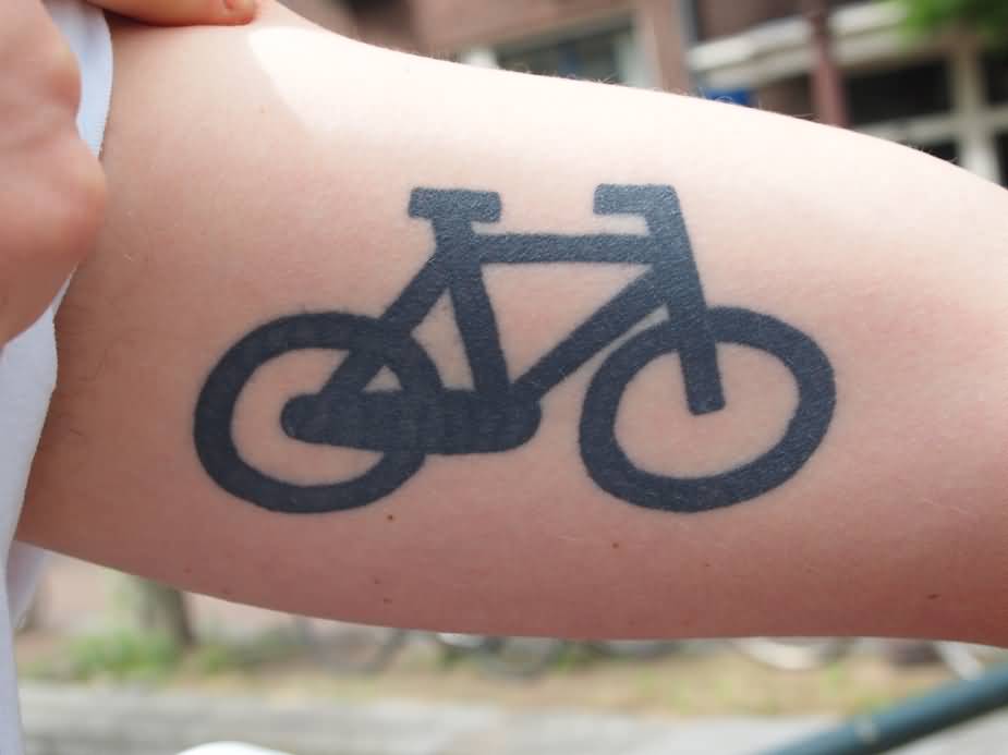 Nice Cycle Silhouette Tattoo On Bicep