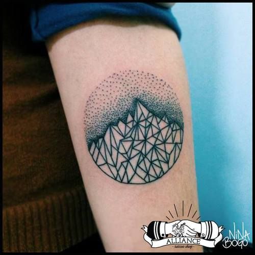 Nice Geometric Dotwork Mountains In Circle Tattoo