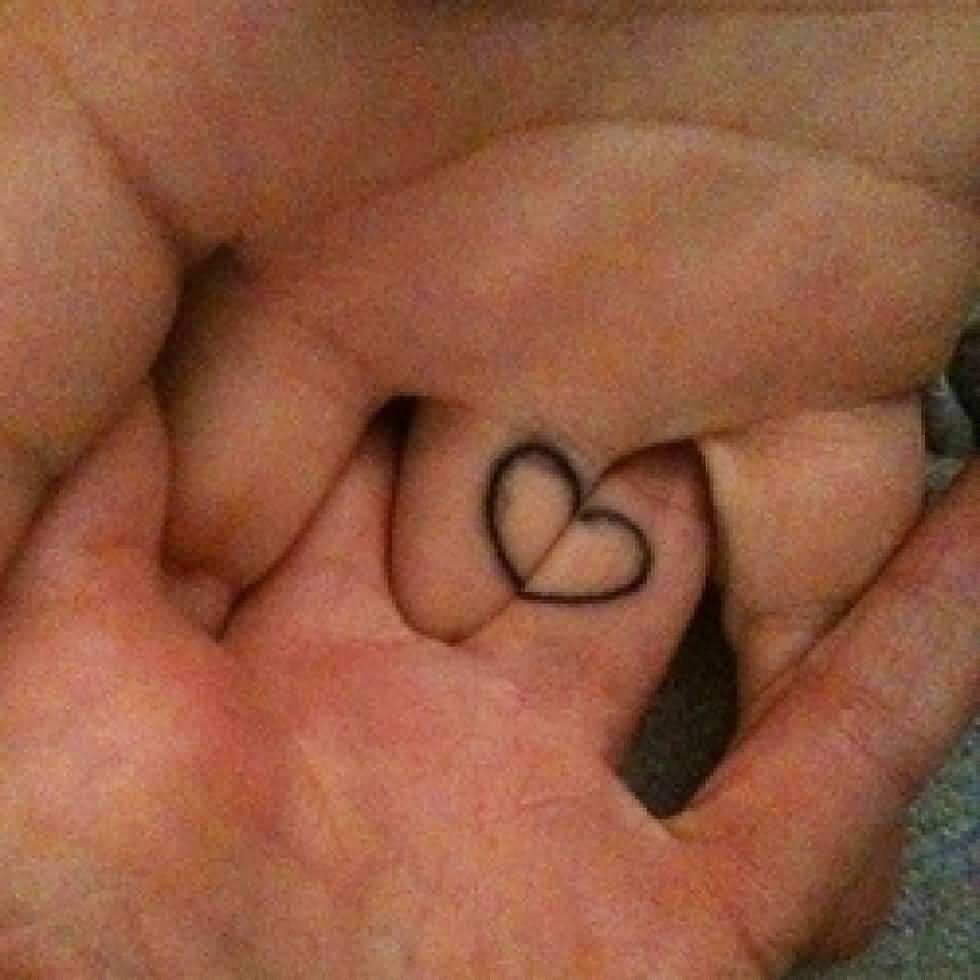 Nice Heart Outline Matching Tattoos On Fingers