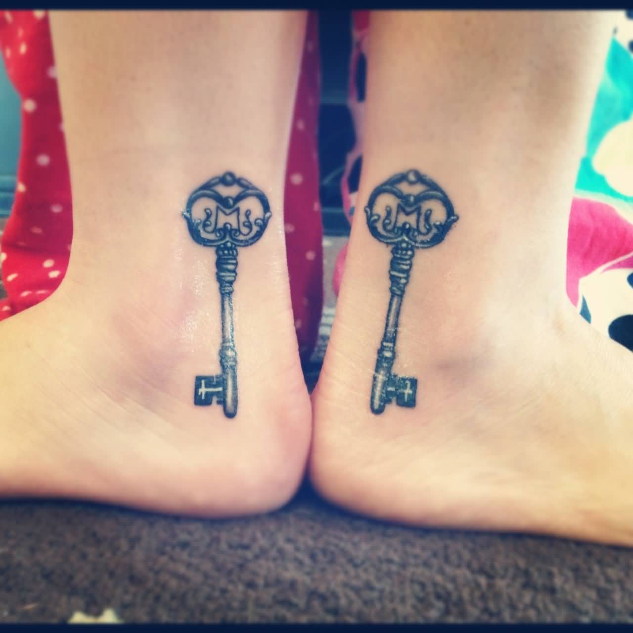 Nice Keys Matching Tattoos On Both Foots