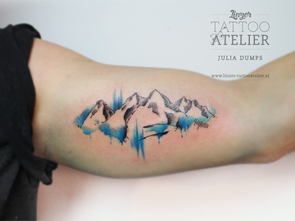Nice Mountains Watercolors Tattoo On Bicep