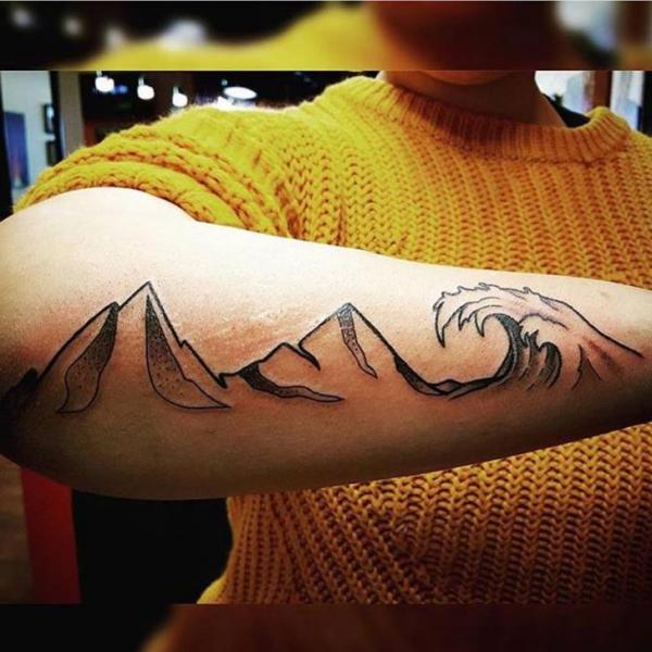 Nice Mountains With Water Waves Tattoo On Arm Sleeve