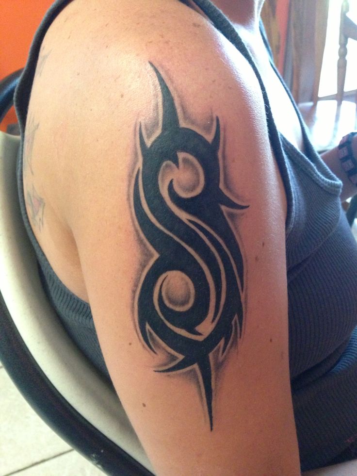 Nice Slipknot Tribal Tattoo On Right Shoulder
