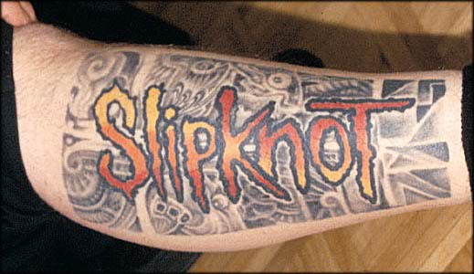 Nice Slipknot Word With Masks Tattoo On Arm Sleeve