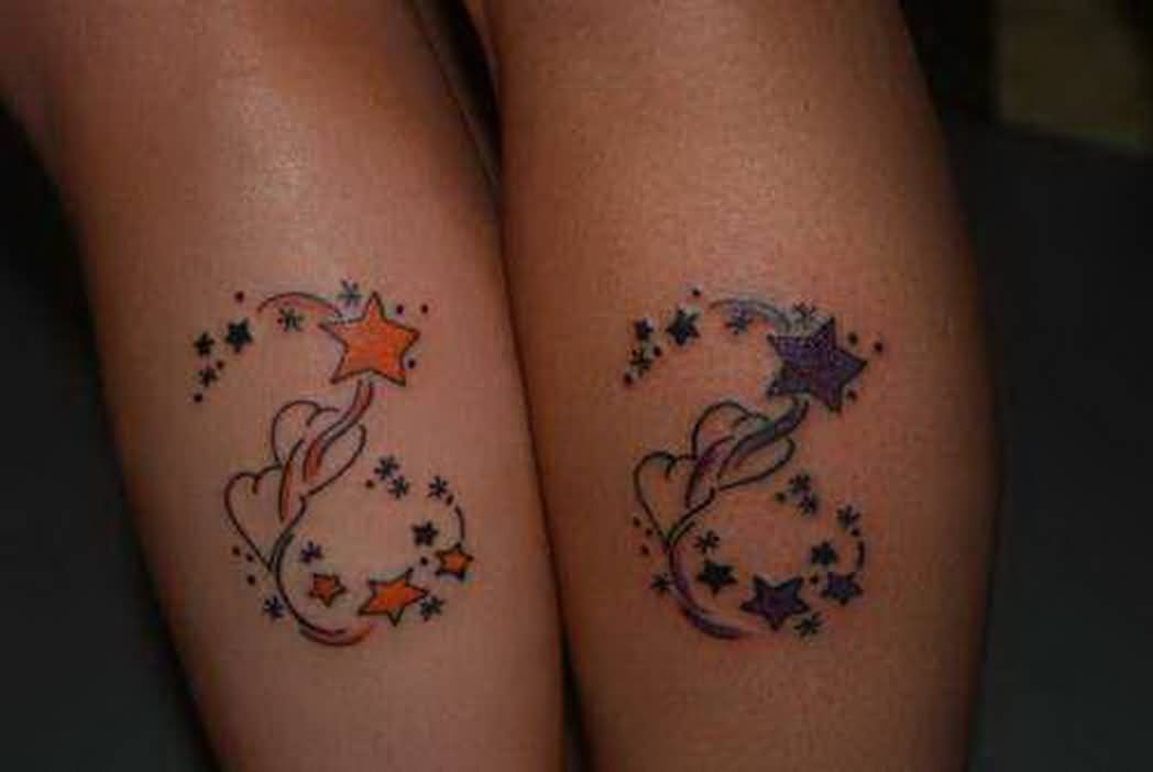 Nicely Designed Different Colored Stars With Heart Matching Tattoos