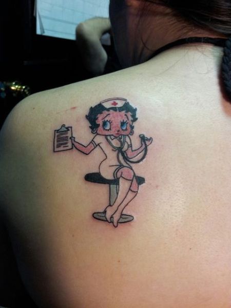 Nurse Betty Boop Tattoo On Left Back Shoulder