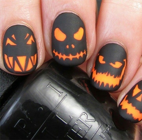 Orange And Black Matte Scary Face Halloween Nail Art