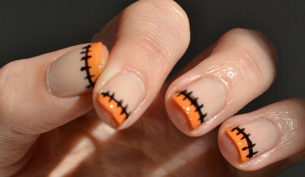 Orange French Tip Stitches Design Halloween Nail Art