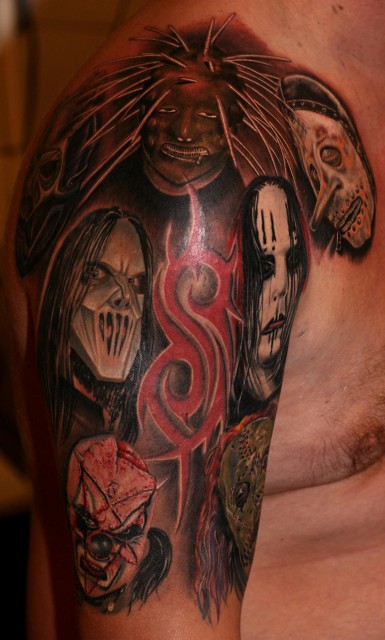 Outstanding Slipknot Members With Red Tribal Logo Tattoo On Half Sleeve