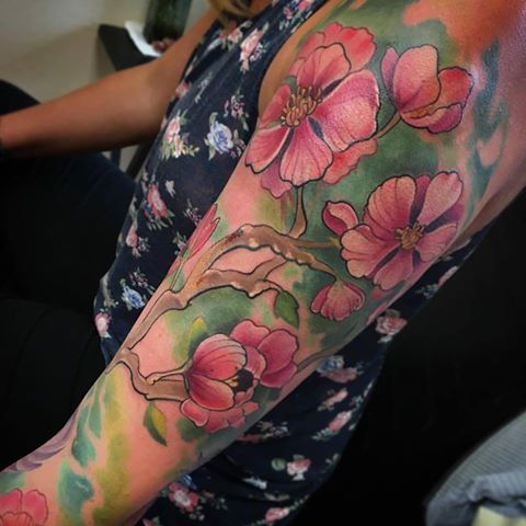 Pink Flowers Tattoo On Left Half Sleeve by Melissa Fusco