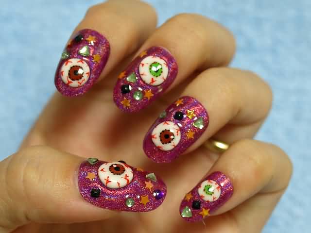 Pink Glitter Nails With Scary Eyes And Rhinestones Design Halloween Nail Art