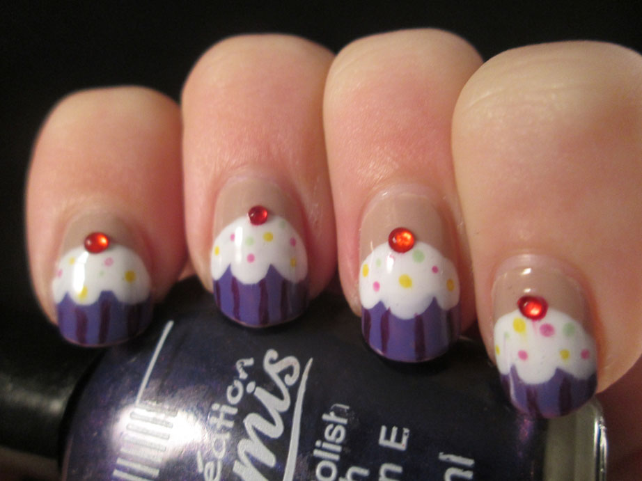 Purple Cupcake Nails With Red Rhinestones Design
