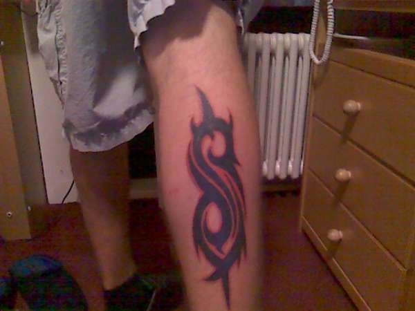 Purple Slipknot Logo Tribal Tattoo On Leg