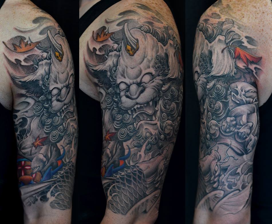 Realistic Color Angry Foo Dog With Leaves Tattoo On Half Sleeve