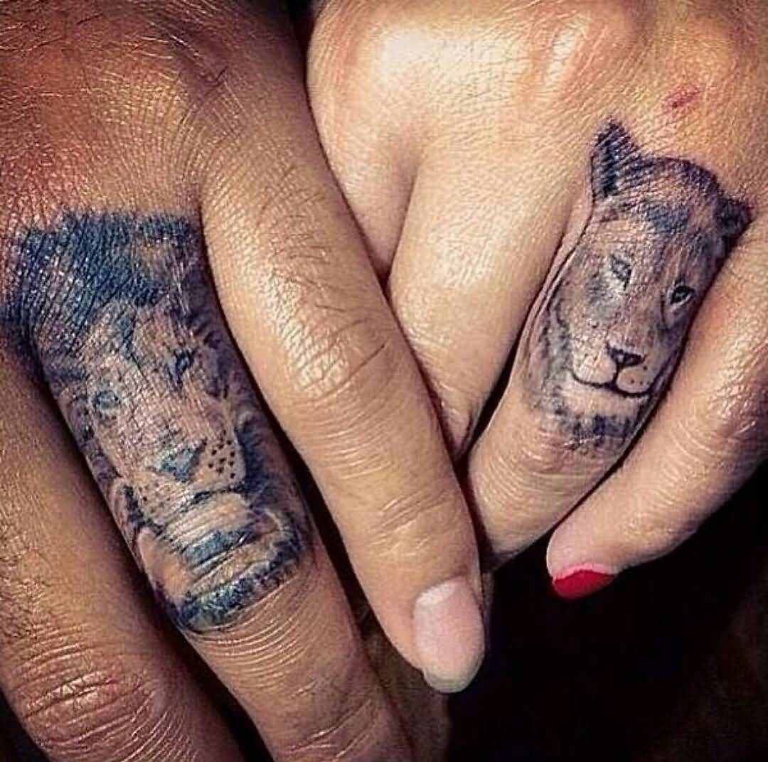 Realistic Lion And Lioness Head Matching Tattoos On Fingers