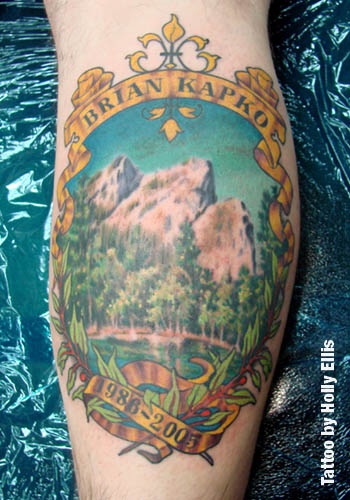 Realistic Mountains Scene In Nice Frame Tattoo