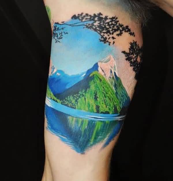 Realistic Mountains With Trees And Water Tattoo On Bicep Sleeve