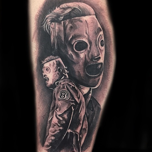Realistic Black And Grey Slipknot Member Tattoo
