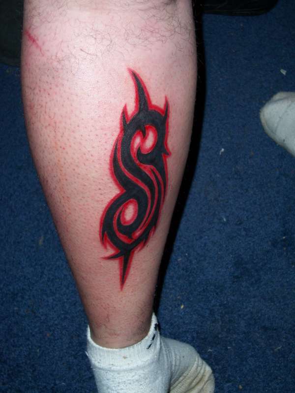 Red And Black Slipknot Tribal Logo Tattoo On Back Leg