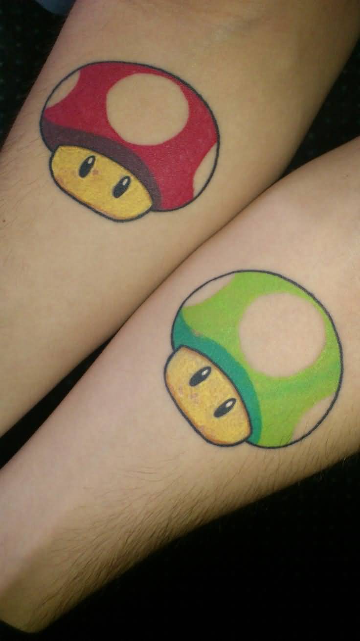 Red And Green Mario Characters Head Matching Tattoos On Forearms