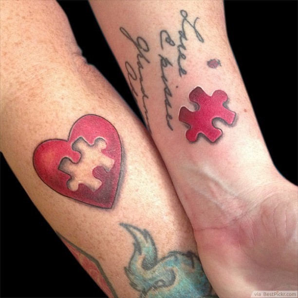 Red Color Missing Puzzle Matching Tattoos On Forearms