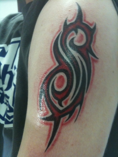 Red Color Slipknot Tribal Logo Tattoo On Left Shoulder