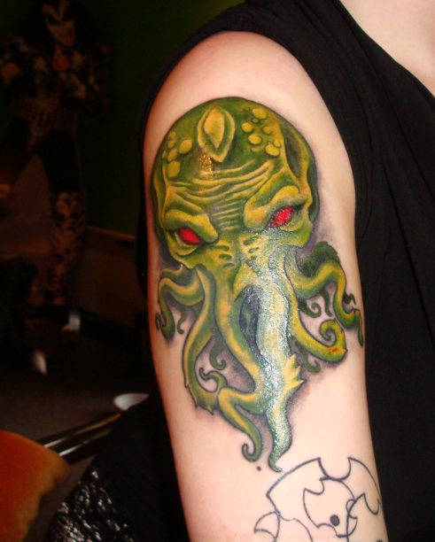 Red Eyes Green Cthulhu Tattoo On Right Half Sleeve