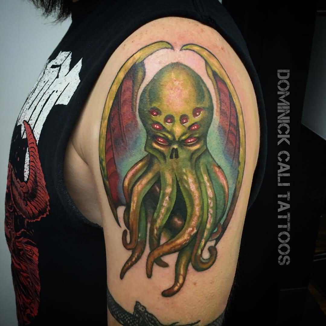 Red Eyes Green Cthulhu Tattoo On Shoulder
