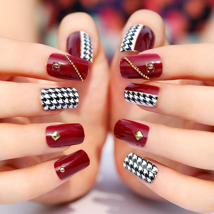 Red Nails With Black And White Houndstooth Nail Art