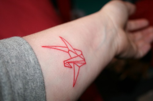 Red Outline Crane Tattoo On Left Arm