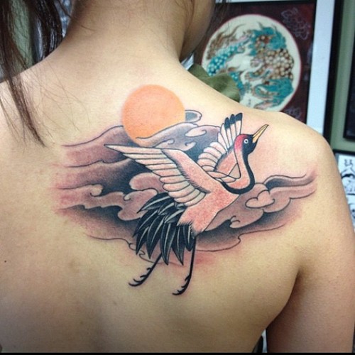 Rising Sun And Flying Crane Tattoo On Right Back Shoulder