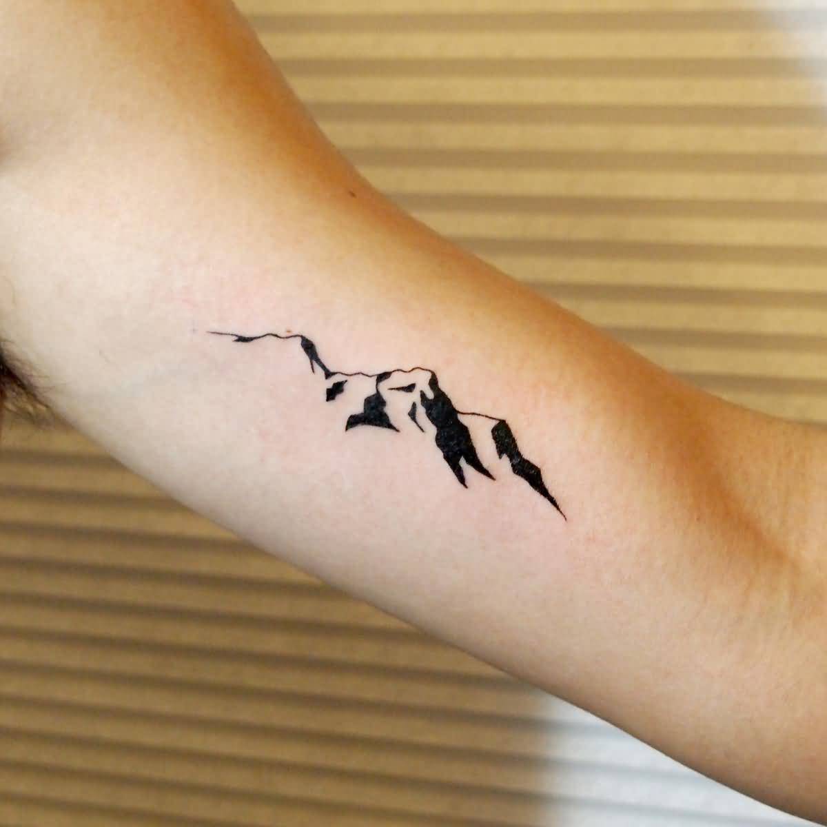 Simple Black Line Mountains Tattoo On Bicep By Jessica Channer