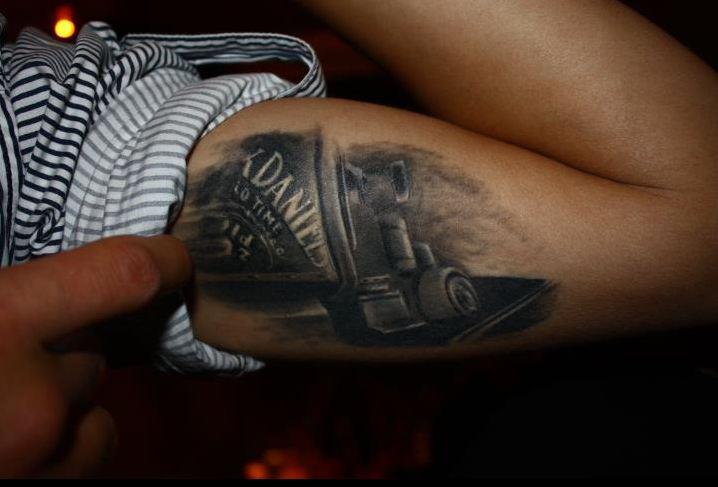 Simple Jack Daniel Label Tattoo On Bicep