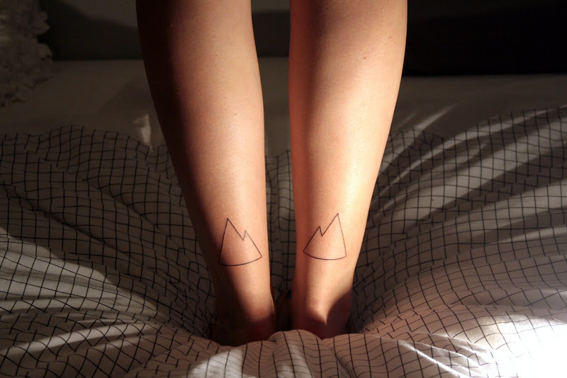 Simple Mountain Tattoos On Both Back Legs