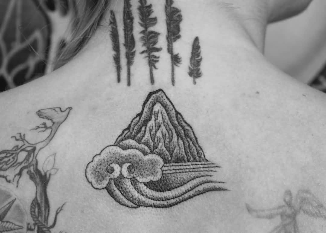 Simple Mountain With Cloud Dotwork Tattoo On Upper Back By Dustin Nowlin