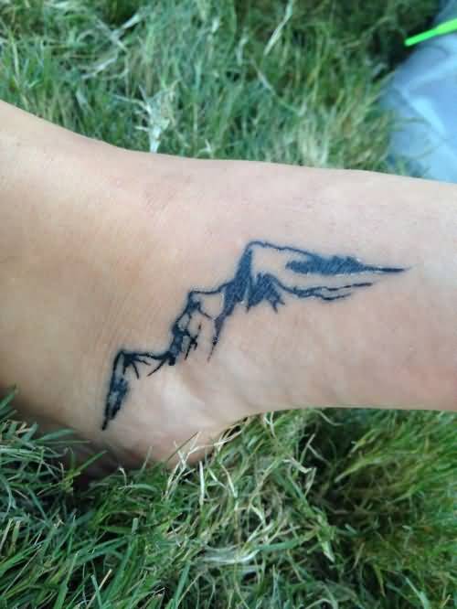 Simple Mountains On Foot Tattoo