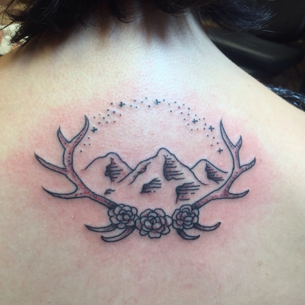 Simple Mountains With Deer Horns Tattoo On Nape
